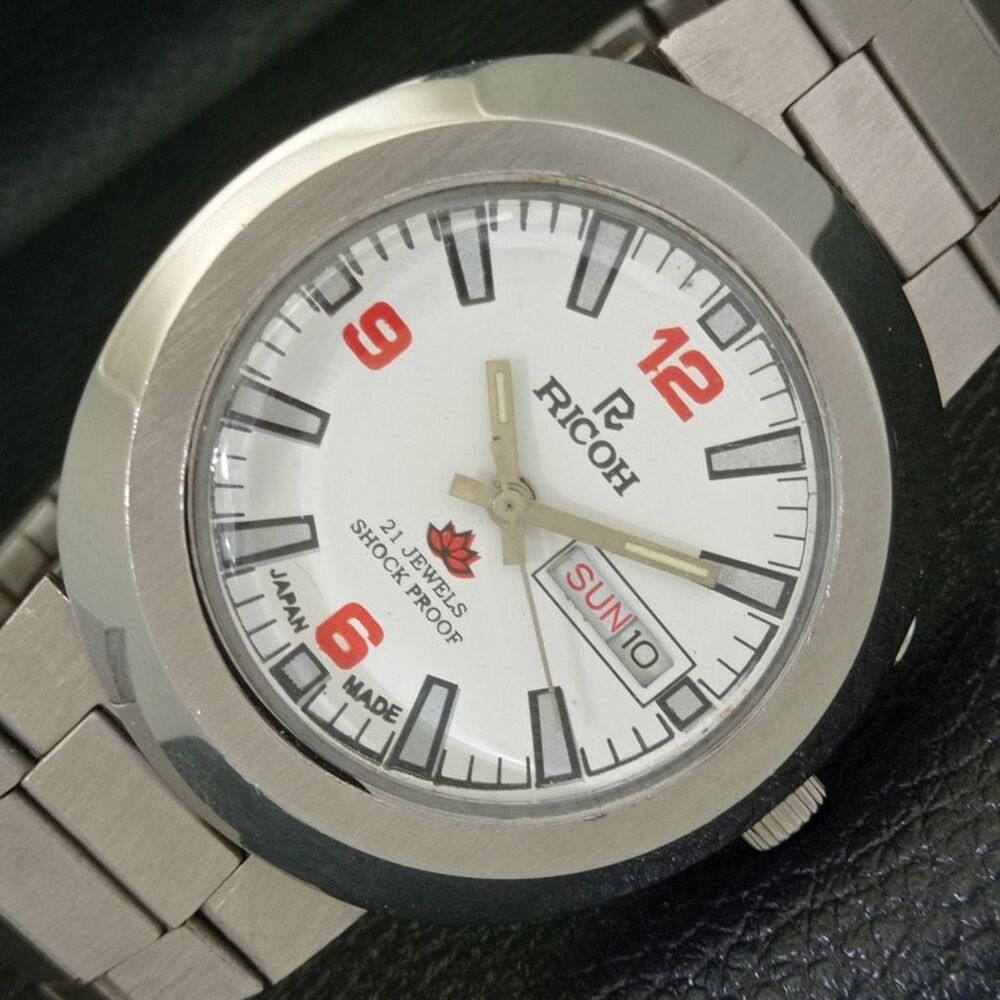 Vintage 1985 Ricoh Automatic Mens Silver Watch W/daydate & Red accents